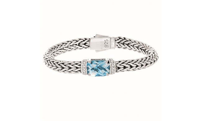 Sterling Silver 7.5 Inch 7x14mm Dome Weave Bracelet with 9x11 Faceted Blue Topaz and 1.6 mm White Sapphire