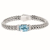 Sterling Silver 7.5 Inch 7x14mm Dome Weave Bracelet with 9x11 Faceted Blue Topaz and 1.6 mm White Sapphire photo